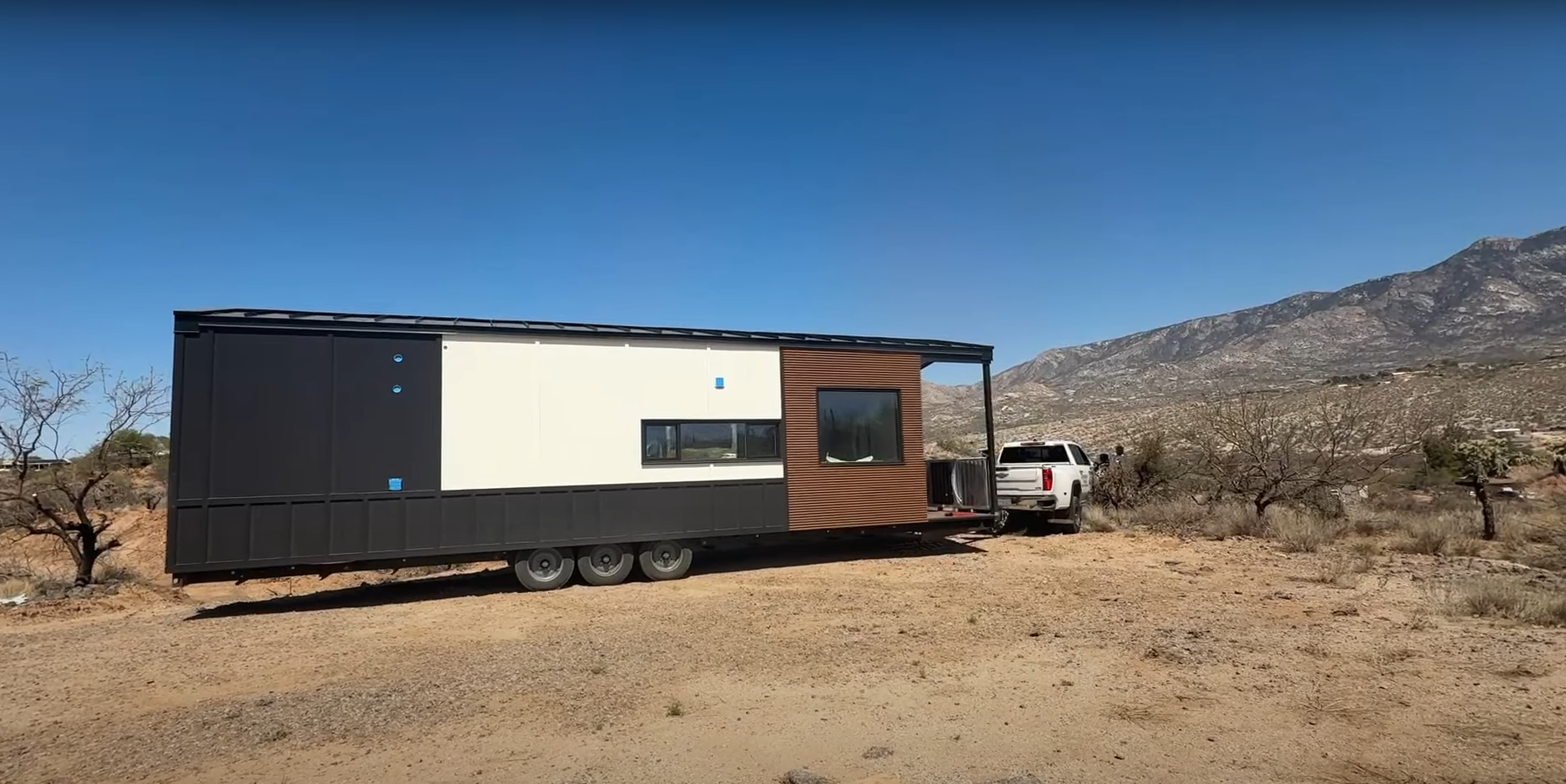 Clever Tiny Home parked in Arizona with mini-split AC unit and cellular window shades