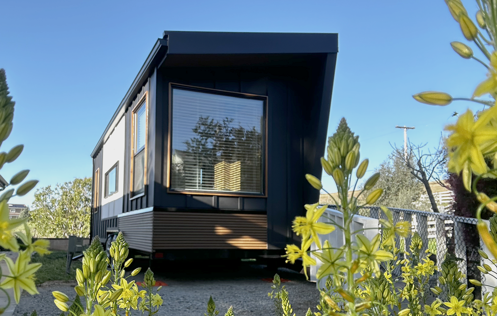 Customer photo of her Clever S parked in her backyard in California
