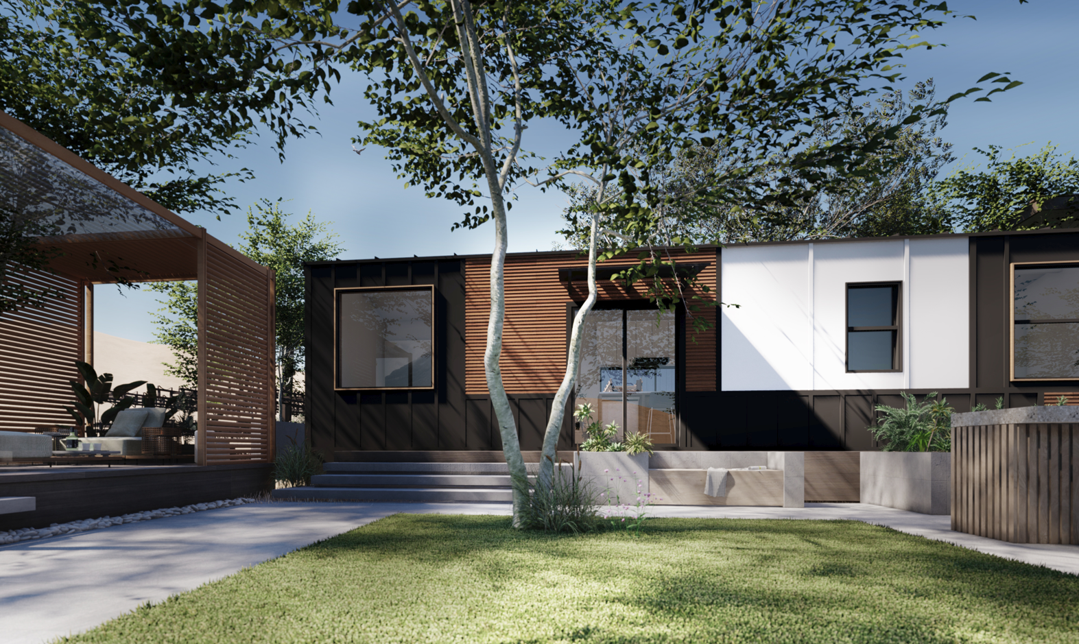 Wide, modern modular home exterior in natural light.