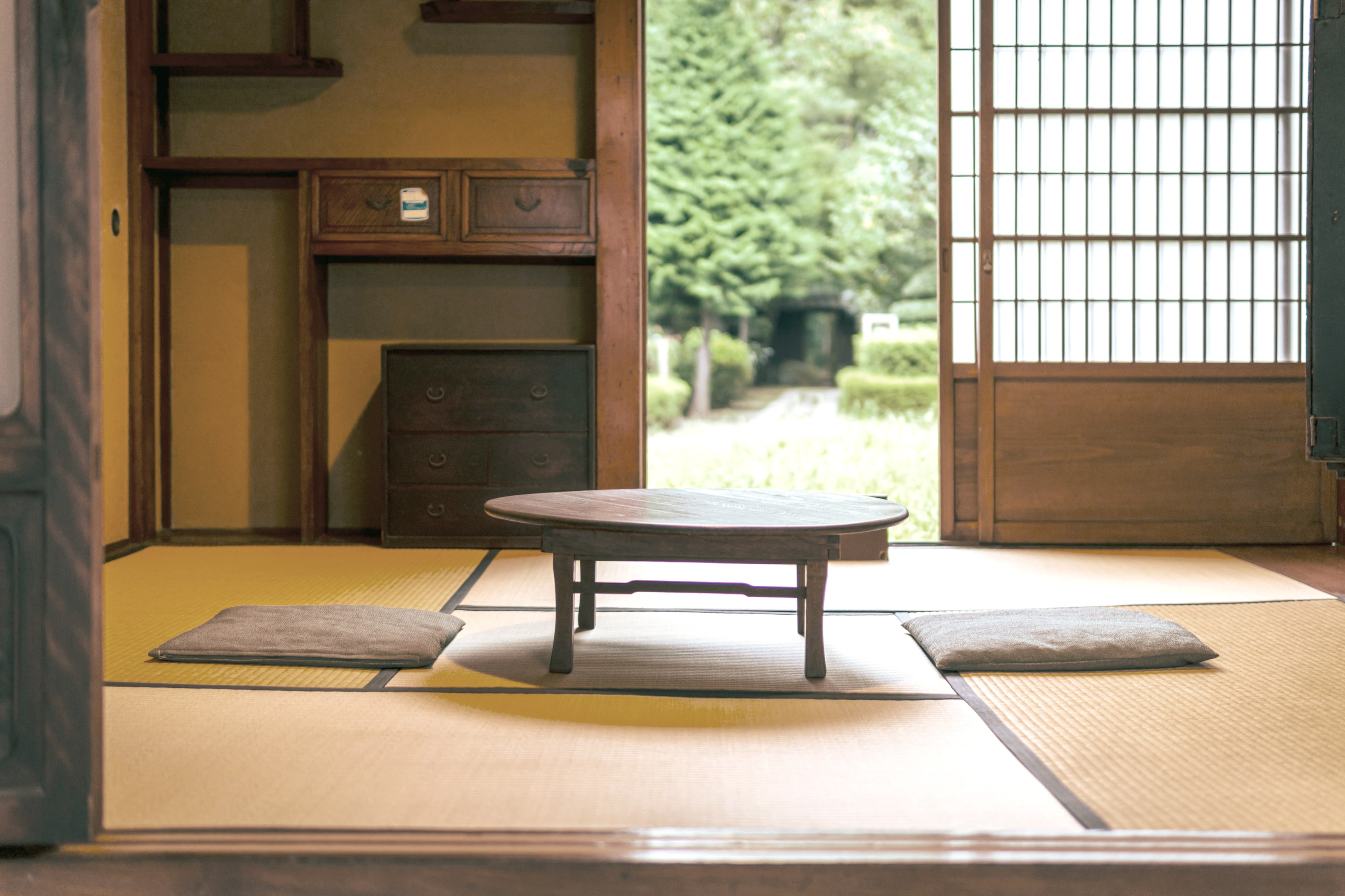 Photo of a home in Japan shows multi-functional use of dining and sleeping area.
