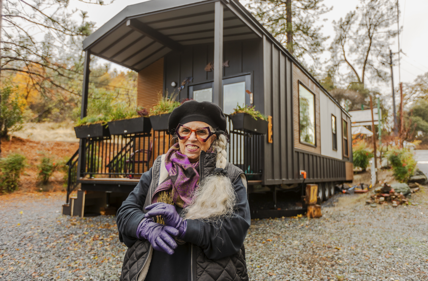 Modern tiny home with bedroom downstairs, built to California residential code for durability and insurance compliance.
