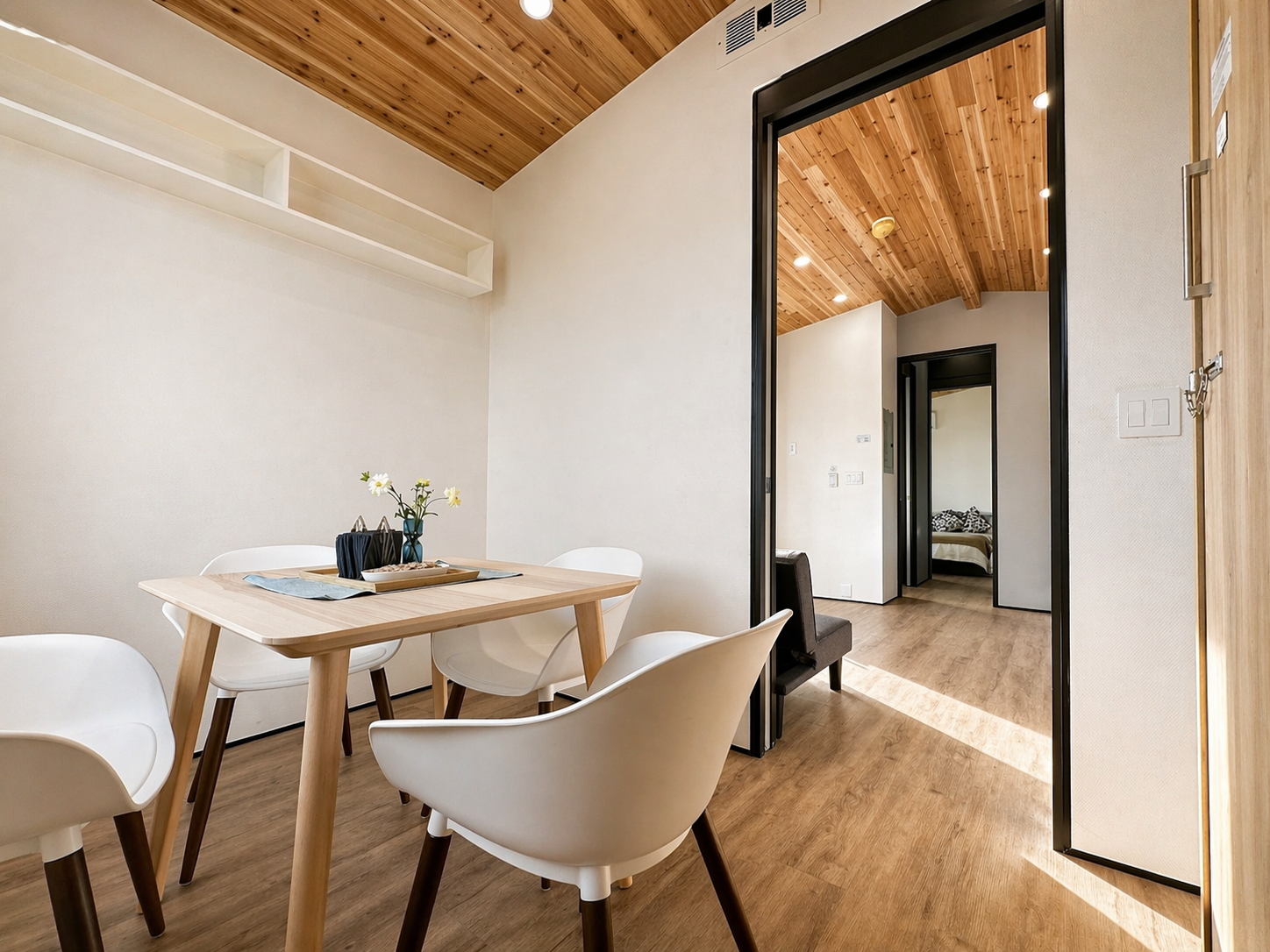 A 2-bedroom tiny home with a full kitchen, full bathroom and modern interiors.