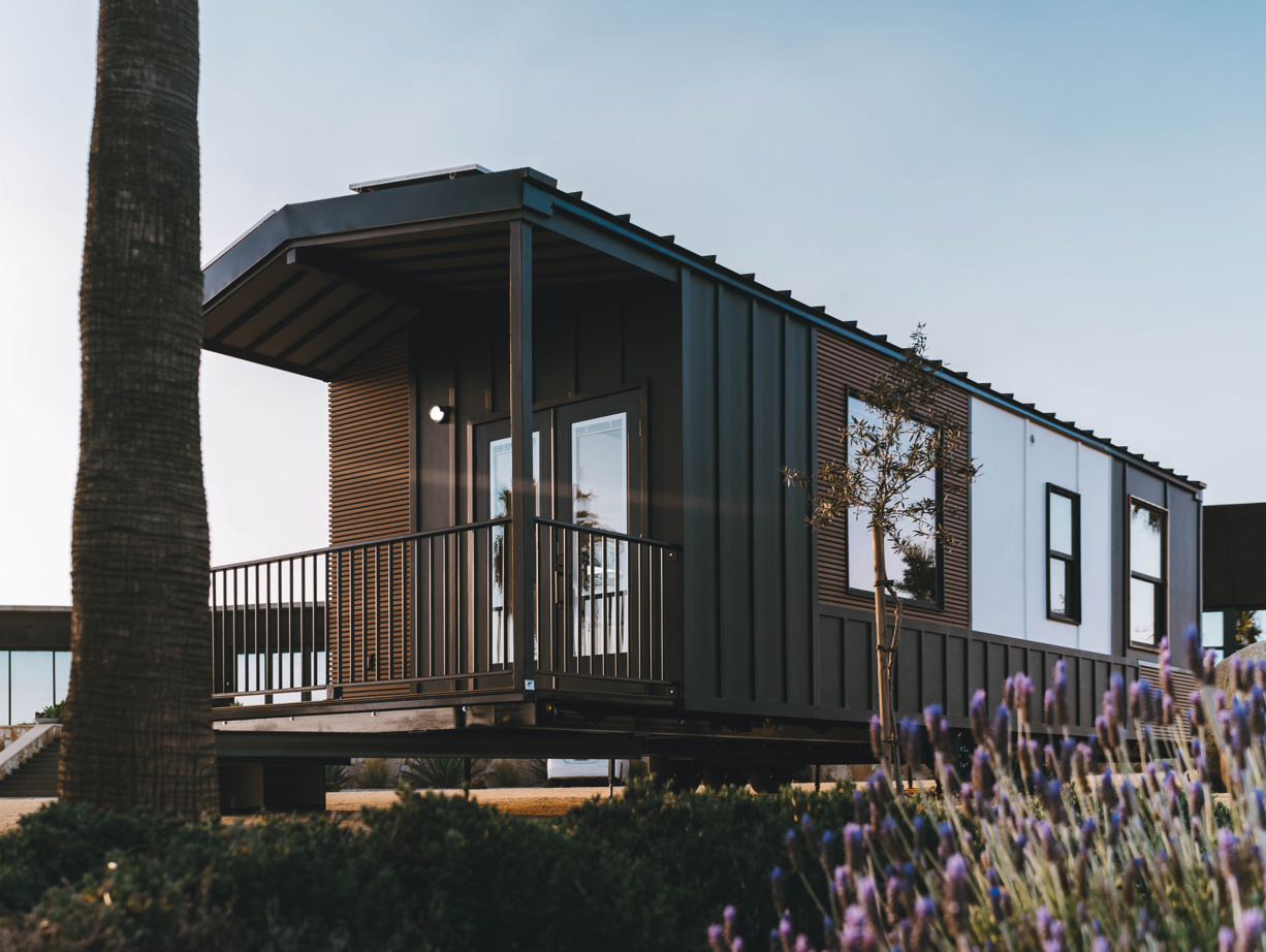 Clever 1 luxury tiny home interior featuring architect-designed open layout with spa bathroom, quartz countertops, and energy-efficient systems
