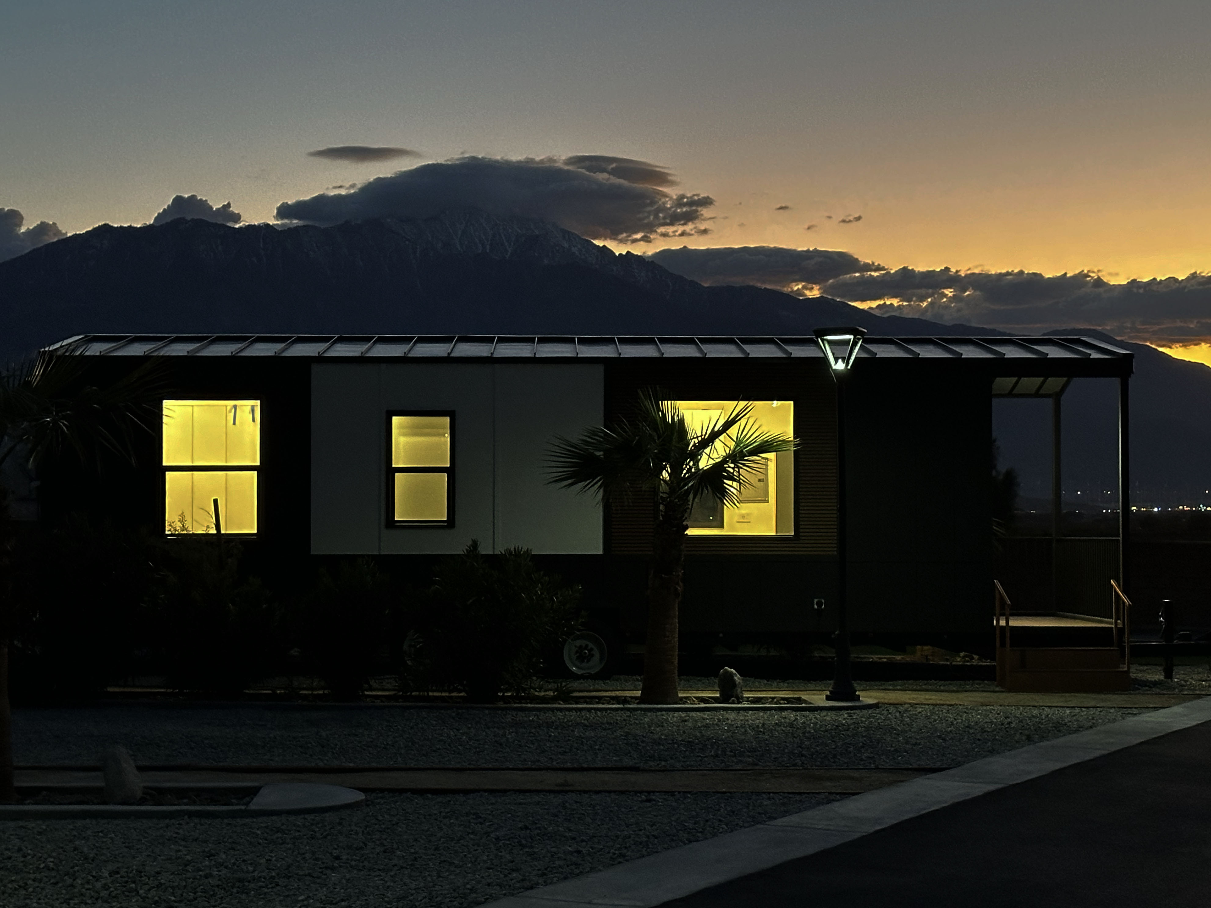 Photo of a Clever 1-bedroom model against a picturesque sunset