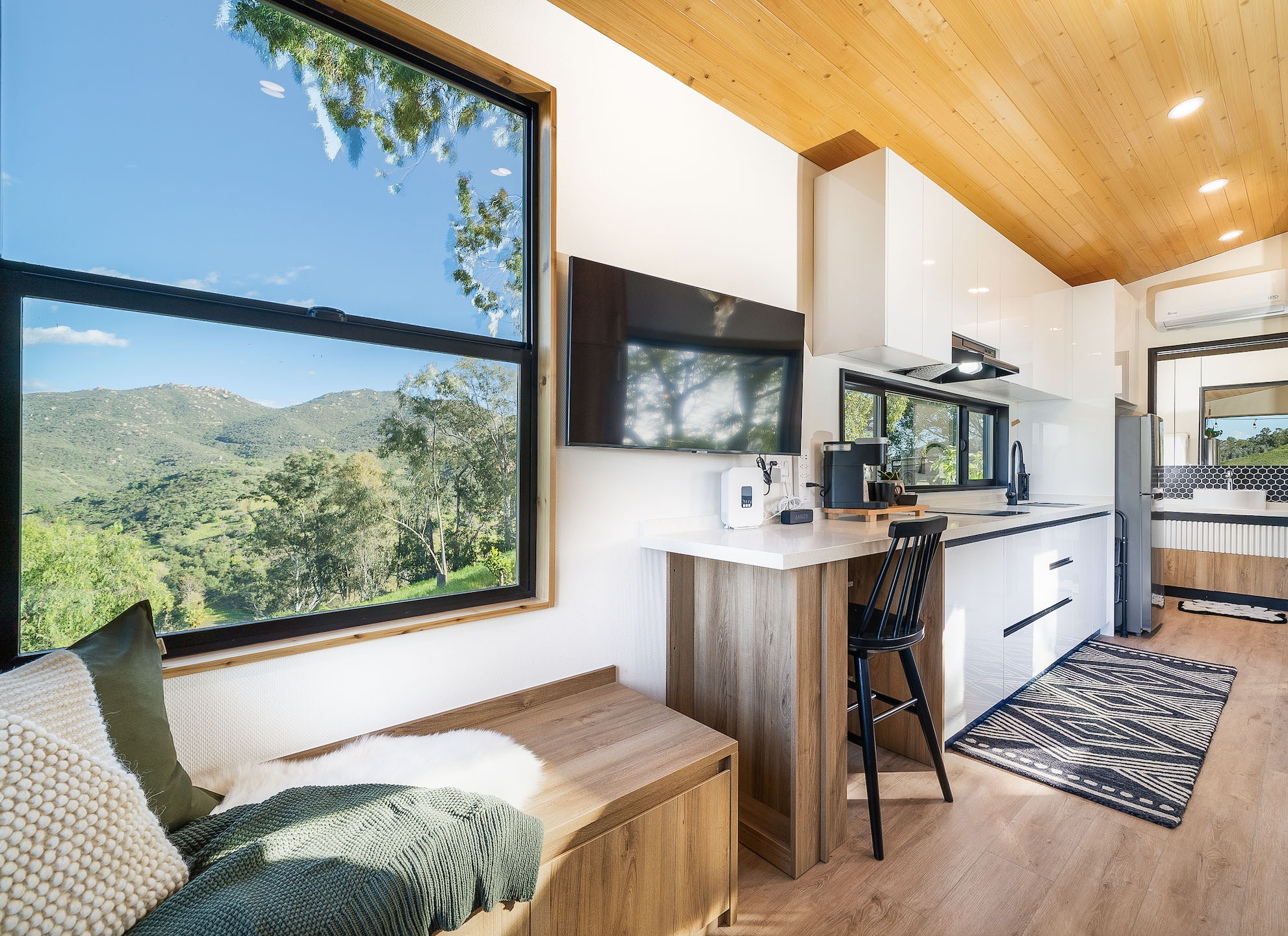A Clever S open floor plan showing the living room and wide kitchen